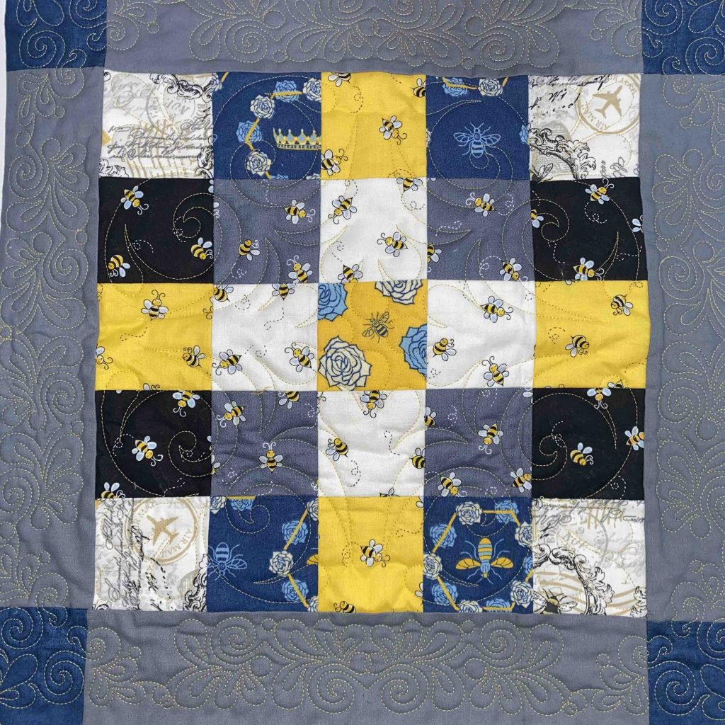 QUILTER’S GRID CUSHION with John J. Cole-Morgan